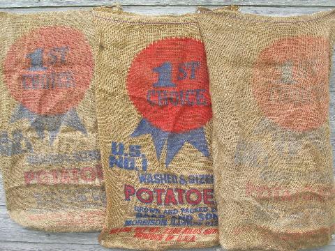 vintage farm primitive burlap potato bags w/ bright advertising graphics