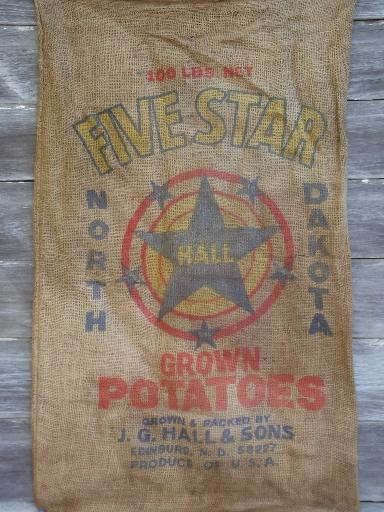 vintage farm primitive burlap potato bags w/ bright advertising graphics