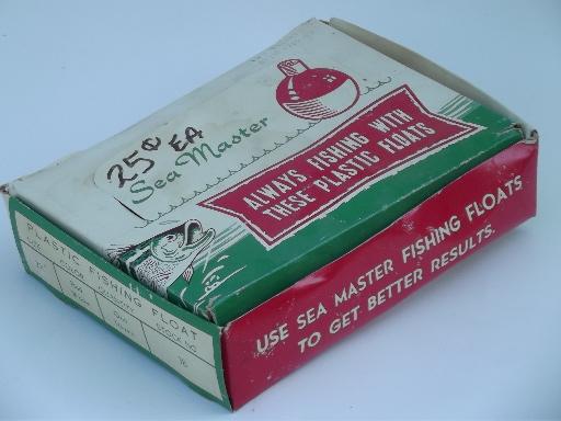 vintage fishing floats in original box, big red and white plastic bobbers