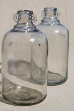 vintage glass jugs, primitive half gallon jug bottles w/ ears for bail handles