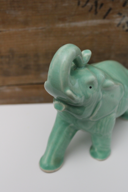 vintage green glaze ceramic elephant trunk up lucky figurine, mid-century USA pottery