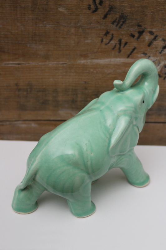 vintage green glaze ceramic elephant trunk up lucky figurine, mid-century USA pottery