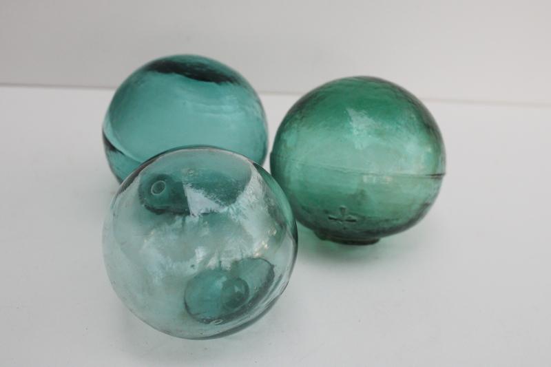 vintage hand blown glass fishing net floats in shades of sea glass
