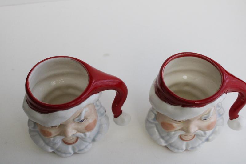 vintage handmade ceramic Santa mugs, winking Santas, retro Christmas decor