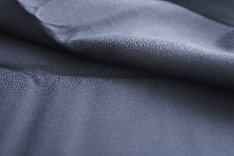 vintage heavy cotton twill fabric, uniform or workwear / outerwear weight, navy blue