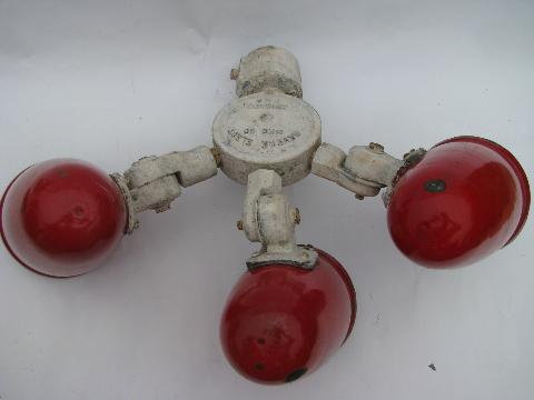 vintage industrial light cluster w/3 red torpedo shades