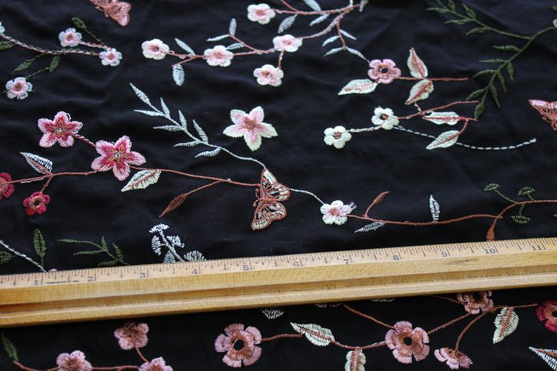 vintage machine embroidered rayon fabric, silky thread floral pattern on black
