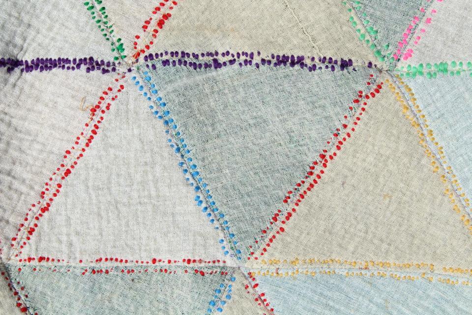 vintage make do wool blanket bedspread, yarn hand stitching patchwork triangle block wheels
