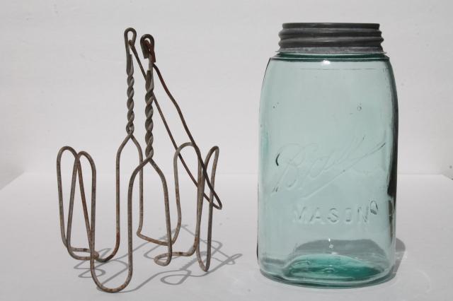 vintage mason jar carrier rack, wire handle basket holds old blue glass jar