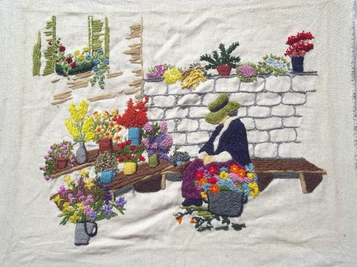 vintage needlework picture, flower peddler lady, embroidered wool on linen