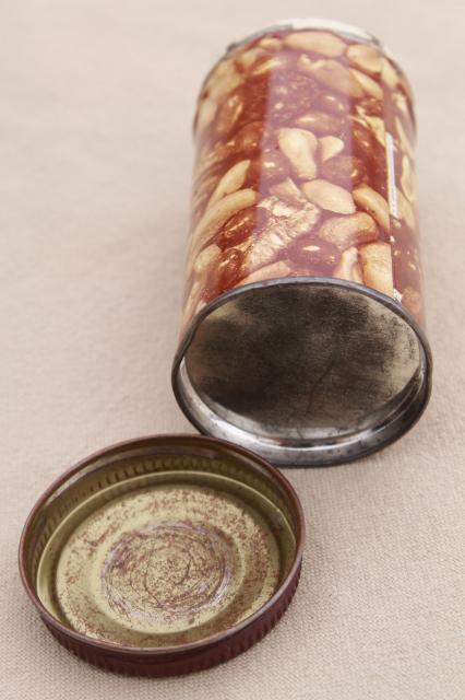 vintage novelty joke toy, exploding snake in a can, can of nuts w/ pop out spring snake