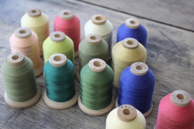 vintage nylon sewing thread in jewel colors on big old wooden spools