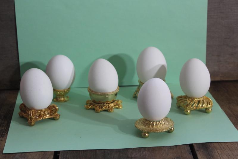 vintage ornamental egg stands, six ornate gold tone metal egg holders