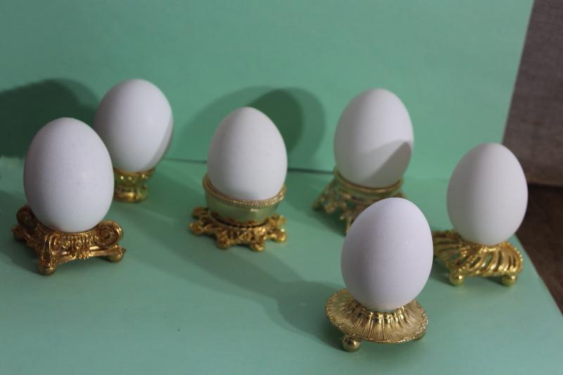 vintage ornamental egg stands, six ornate gold tone metal egg holders