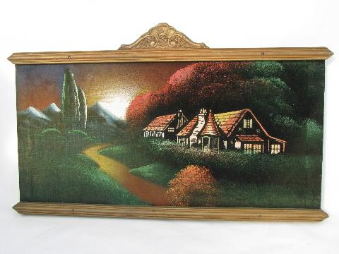 vintage paintings on velvet, old wood frames w/ crown molding, faux graining