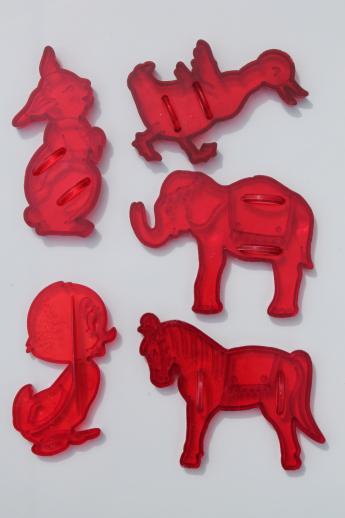 vintage plastic cookie cutter stampers, lot of cookie cutters w/ Robin Hood characters etc.