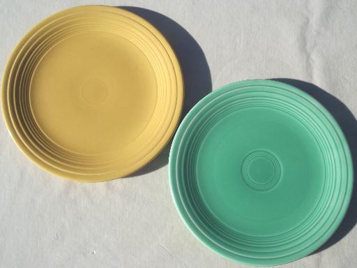 vintage pottery plates in pretty pastels, shabby cottage kitchen dishes