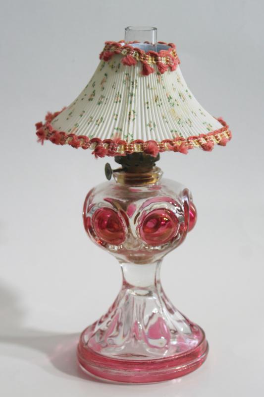 vintage pressed glass oil lamp, bullseye pattern w/ ruby stain color