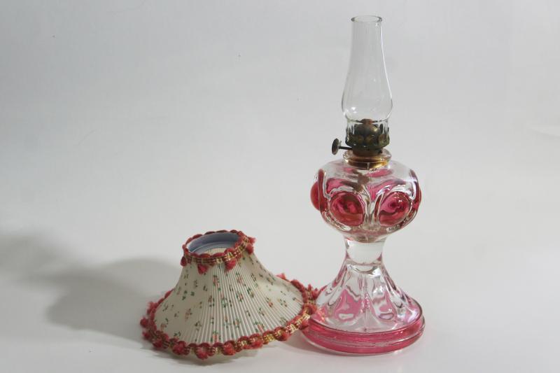 vintage pressed glass oil lamp, bullseye pattern w/ ruby stain color