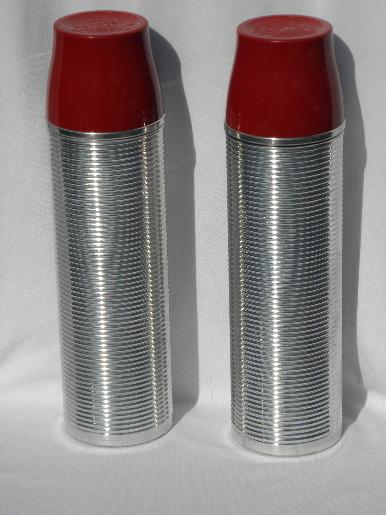 vintage ribbed aluminum thermos vacuum bottles for picnics, tailgating