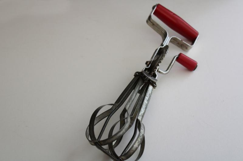 vintage rotary egg beater, hand crank mixer kitchen utensil w/ red painted wood handles