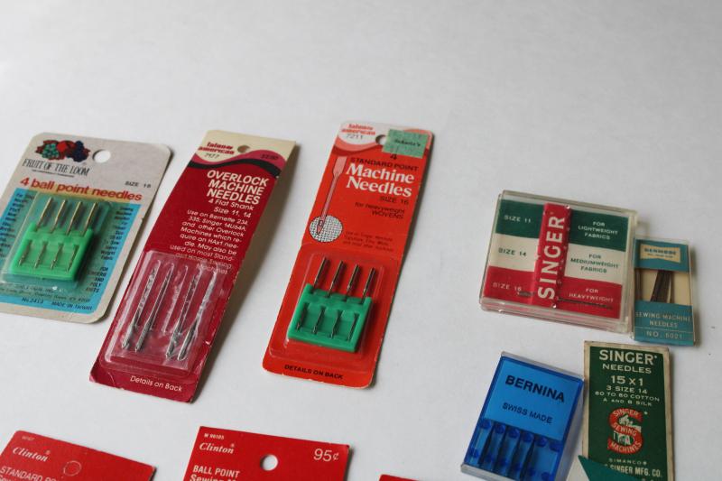 vintage sewing machine needles, old advertising sewing notions counter