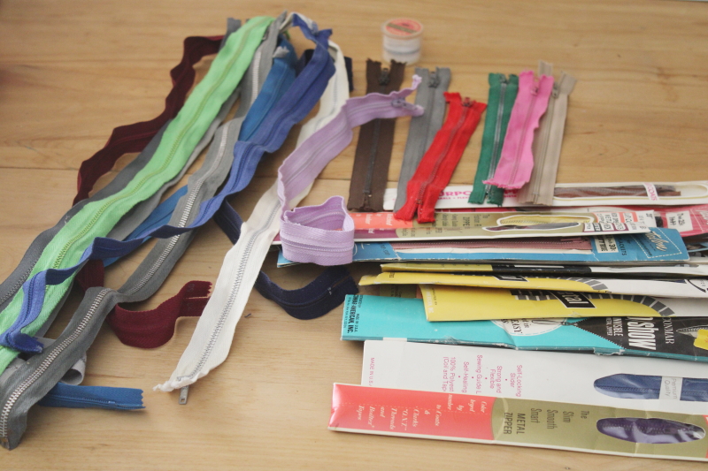 vintage sewing notions, lot of new old stock metal zippers different colors  lengths