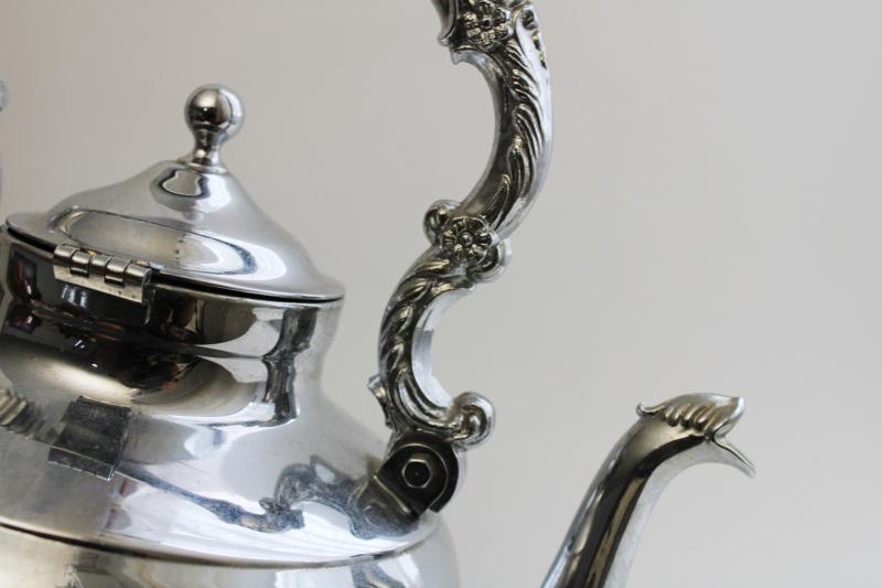 vintage silver chrome tea kettle teapot on stand, old fashioned English tea party decor