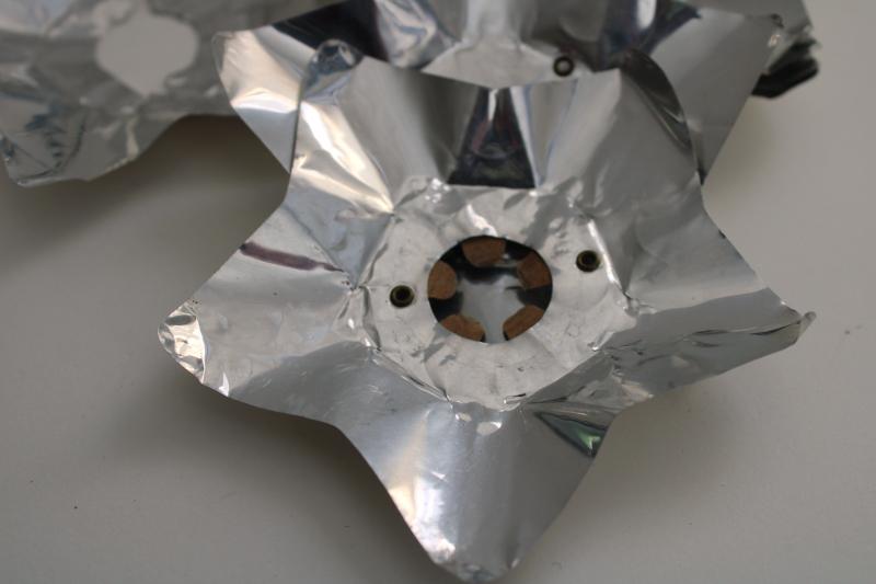 vintage silver foil stars or flowers reflectors for early electric Christmas lights