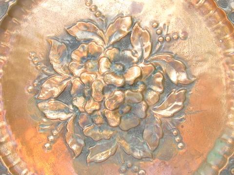 vintage solid copper plate or charger, embossed roses floral repousse