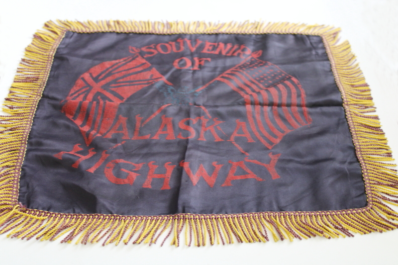 vintage souvenir of the Alaska Highway, fringed rayon pillow cover flocked flags