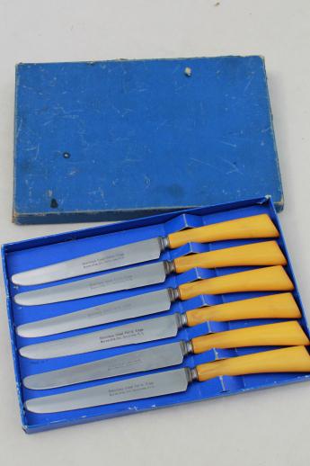 vintage steak knives set with early plastic (butterscotch bakelite