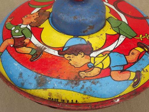 vintage tin toy spinning top, metal top w/ worn old antique paint