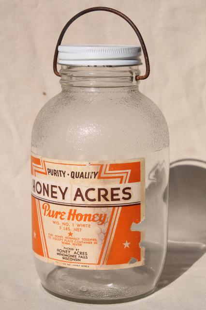 vintage two quart glass jar w/ wire bail handle, old Honey label dated 1942