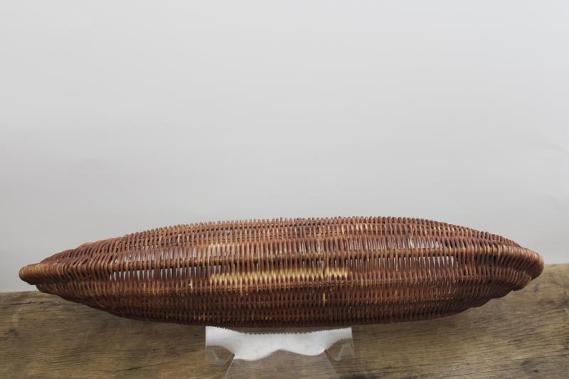 vintage wicker basket, rustic camp souvenir style large hand woven canoe shape