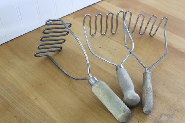 vintage wood handle kitchen utensils, collection of old potato mashers