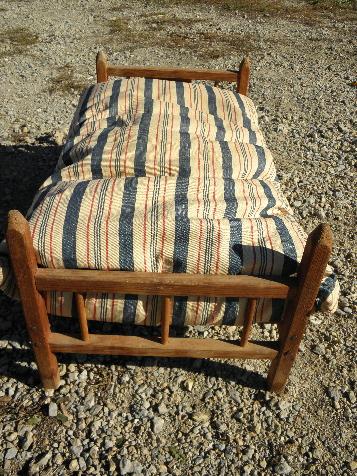 vintage wooden doll bed w/ old red & blue striped ticking feather bed pillow