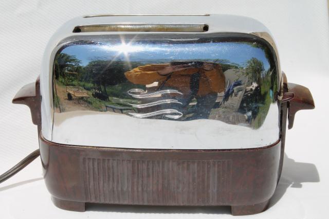 https://laurelleaffarm.com/item-photos/working-1950s-vintage-GE-two-slice-toaster-brown-bakelite-shiny-silver-chrome-Laurel-Leaf-Farm-item-no-z51371-4.jpg