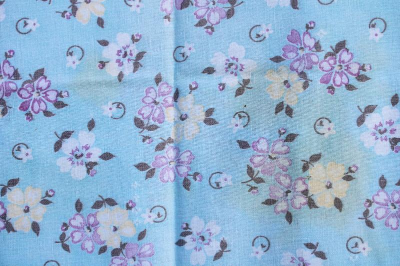 worn soft vintage cotton feedsack fabric, faded print, lavender flowers on blue