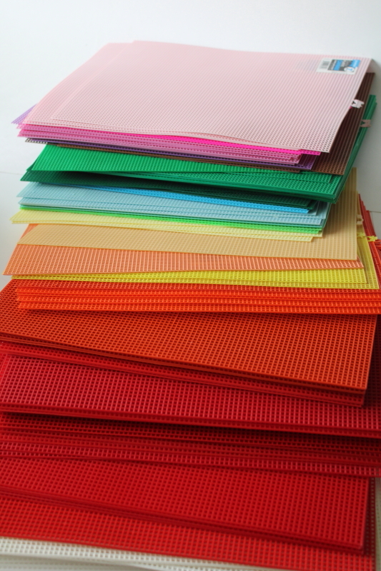 photo of 100+ sheets of plastic canvas in many colors, new old stock craft supplies lot #1