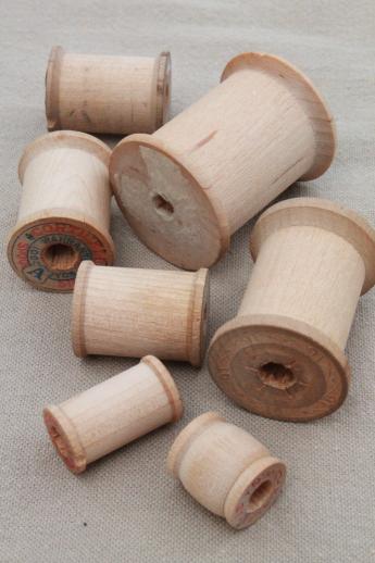 photo of 100 vintage wooden spools, old sewing thread spools, primitive wood spool lot #5