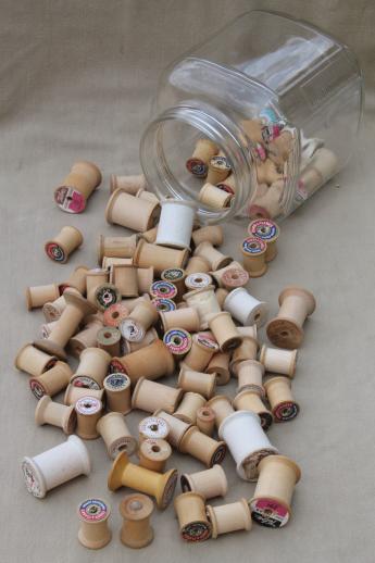 photo of 100 vintage wooden spools, old sewing thread spools, primitive wood spool lot #2