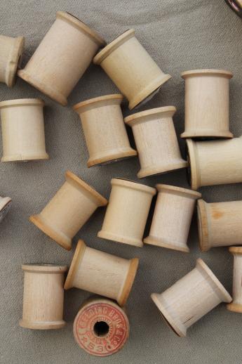 photo of 100 vintage wooden spools, old sewing thread spools, primitive wood spool lot #4