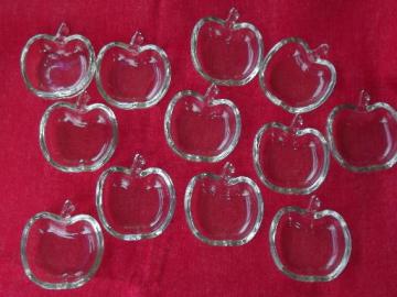 catalog photo of 12 apple shaped pressed glass dishes, salt dips or butter pat plates?