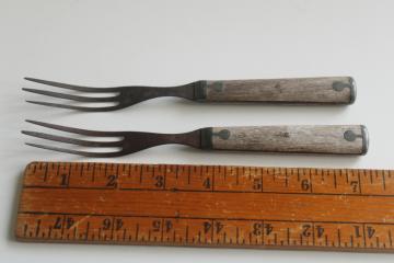 catalog photo of 1800s vintage three tine trident forks, 19th century antique steel forks weathered wood handles 