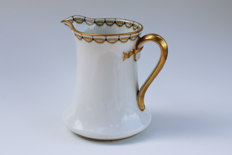 photo of 1920s vintage Haviland Limoges china creamer, embossed bow handle, art deco black mustard gold scalloped pattern #1