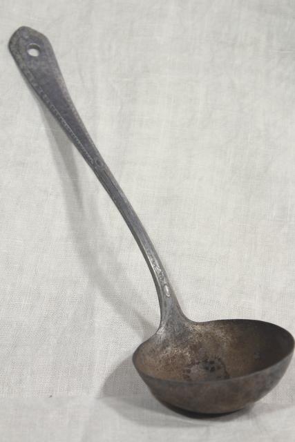 photo of 1920s vintage cast aluminum dipper or soup ladle, marked Germany #1