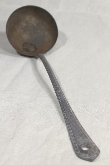 photo of 1920s vintage cast aluminum dipper or soup ladle, marked Germany #4