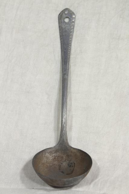 photo of 1920s vintage cast aluminum dipper or soup ladle, marked Germany #5