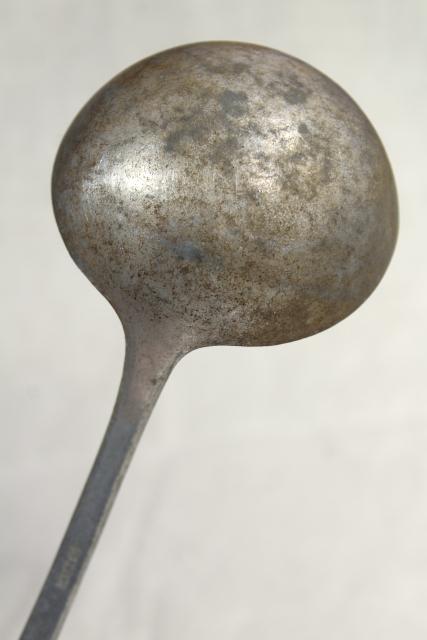 photo of 1920s vintage cast aluminum dipper or soup ladle, marked Germany #8